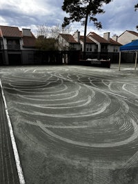 an image of a tennis court with a white line drawn on it